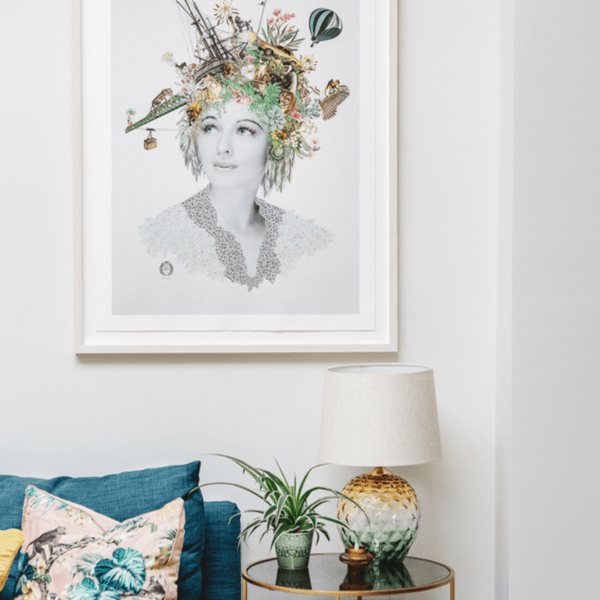 Artwork of a woman's head on the wall