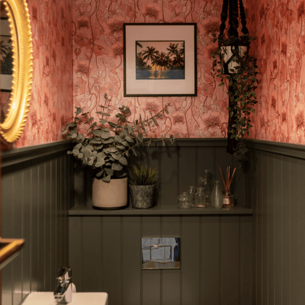A freshly decorated bathroom with Zhoosh woodwork paint on the panelling