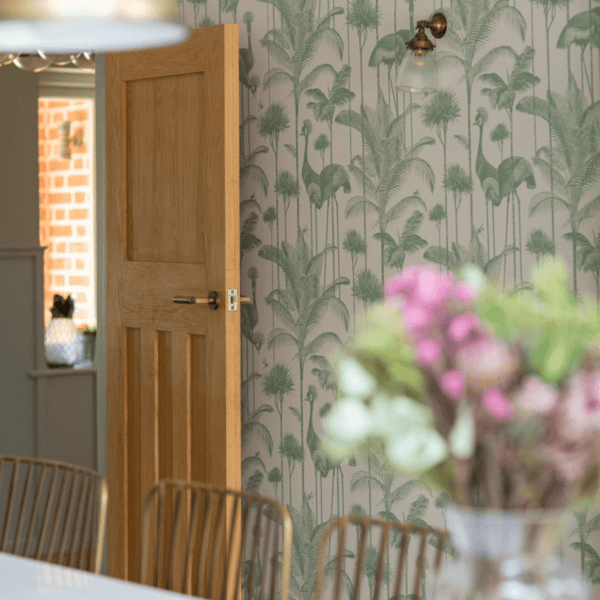 A freshly decorated wall with flowers in the foreground