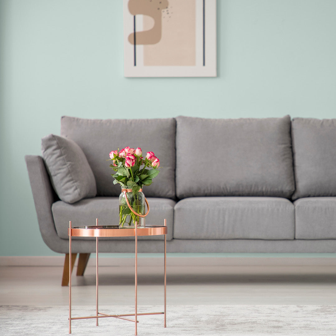 Bright and airy living room decorated in Crystal Waters, a light grey blue paint from Zhoosh.