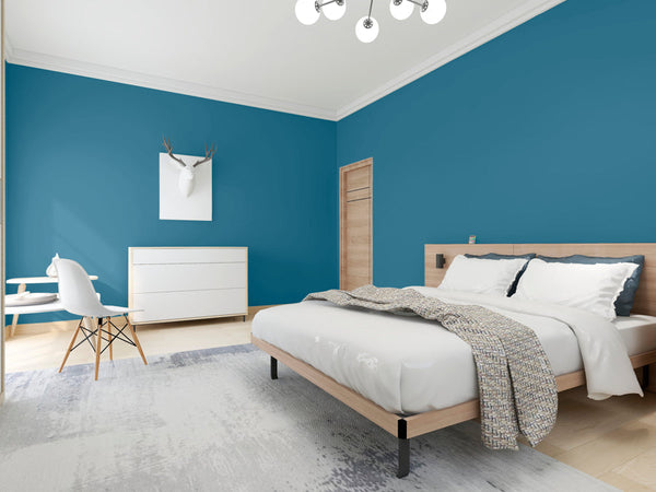 A bedroom decorated with Babbling Brook blue paint from Zhoosh