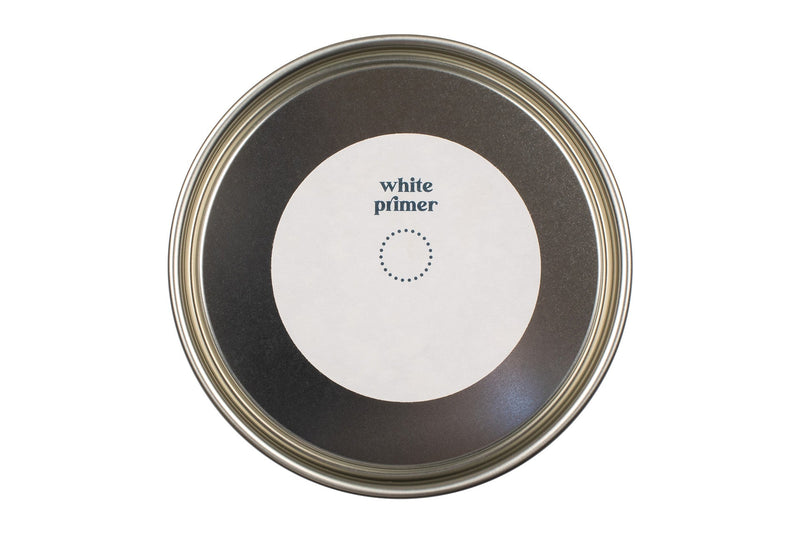 Lid from a White Paint Primer tin